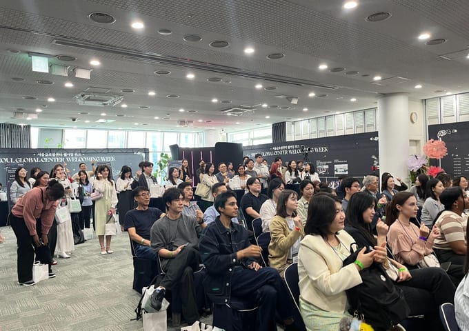 International students and foreign residents seated at an information session in Seoul